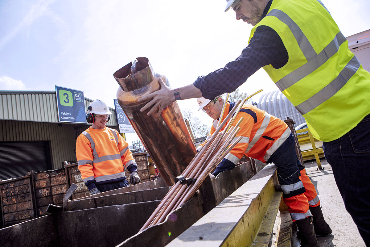 Customers dropping off scrap metal items